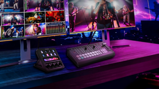 Man seated at computer Video Editing